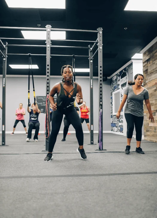 women working out at fit body boot camp